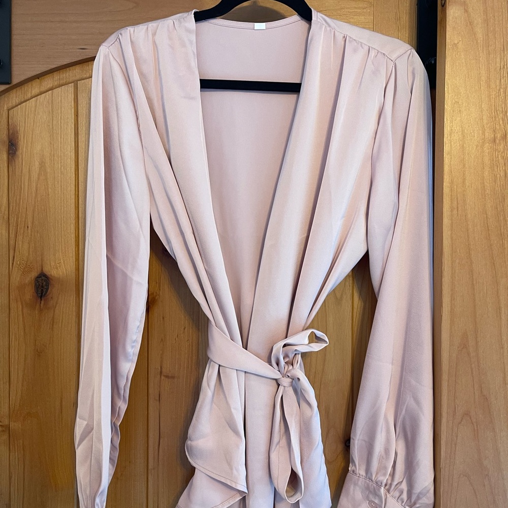 NWOT dusty Rose belted asymmetrical hem blouse.